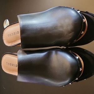 Black studded clog like shoes